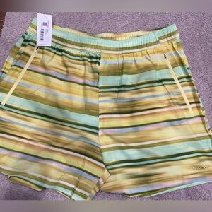 NWT Outdoor Voices Zephyr 5” shorts on Wildflower Haze. Built in shorts, pockets
